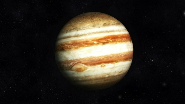 Jupiter mit rot-braunen und weißen Wolkenbändern und dem großen roten Fleck im unteren Drittel der Planetenscheibe. Der Fleck ist tatsächlich wie die Wolkenbänder rot-braun.